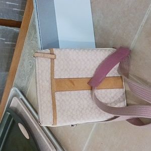 Pink crossbody coach bag approx 8.5/ 7 in.